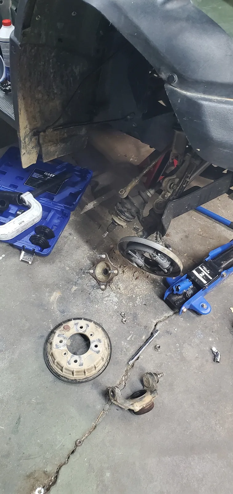 ATV components laid out for inspection